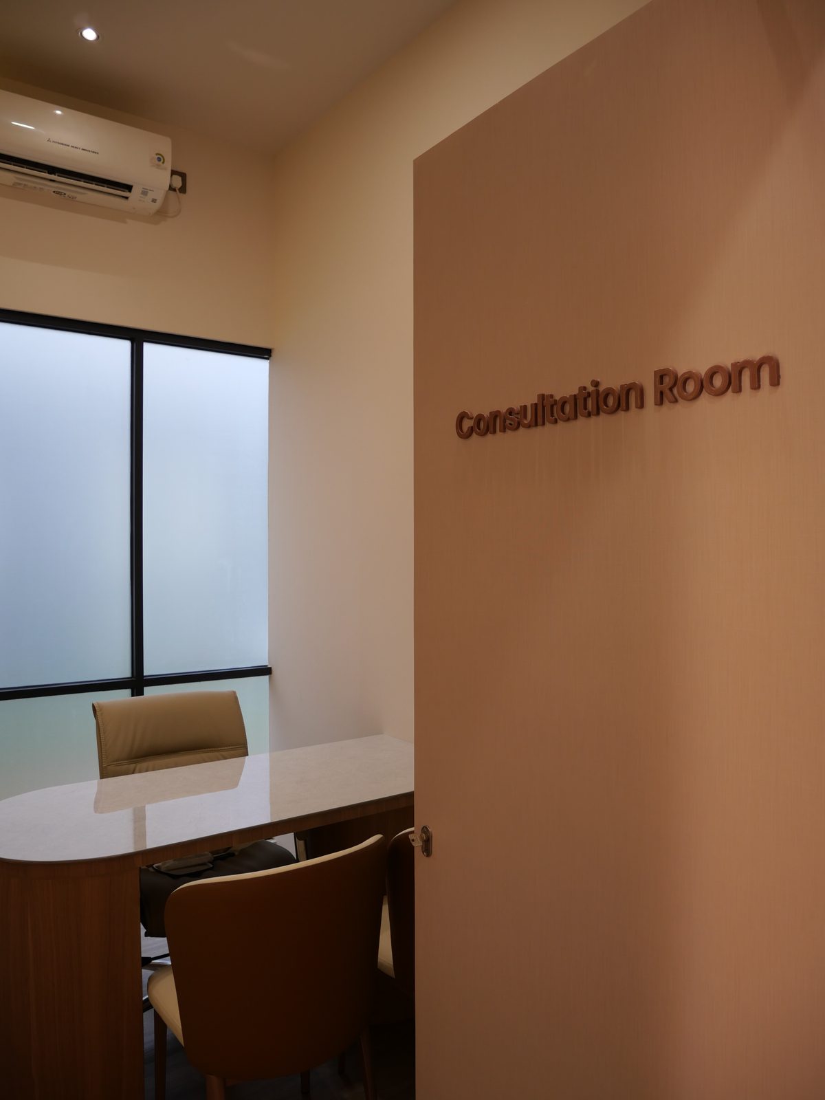 Consultation Room signage in Aviora terracotta