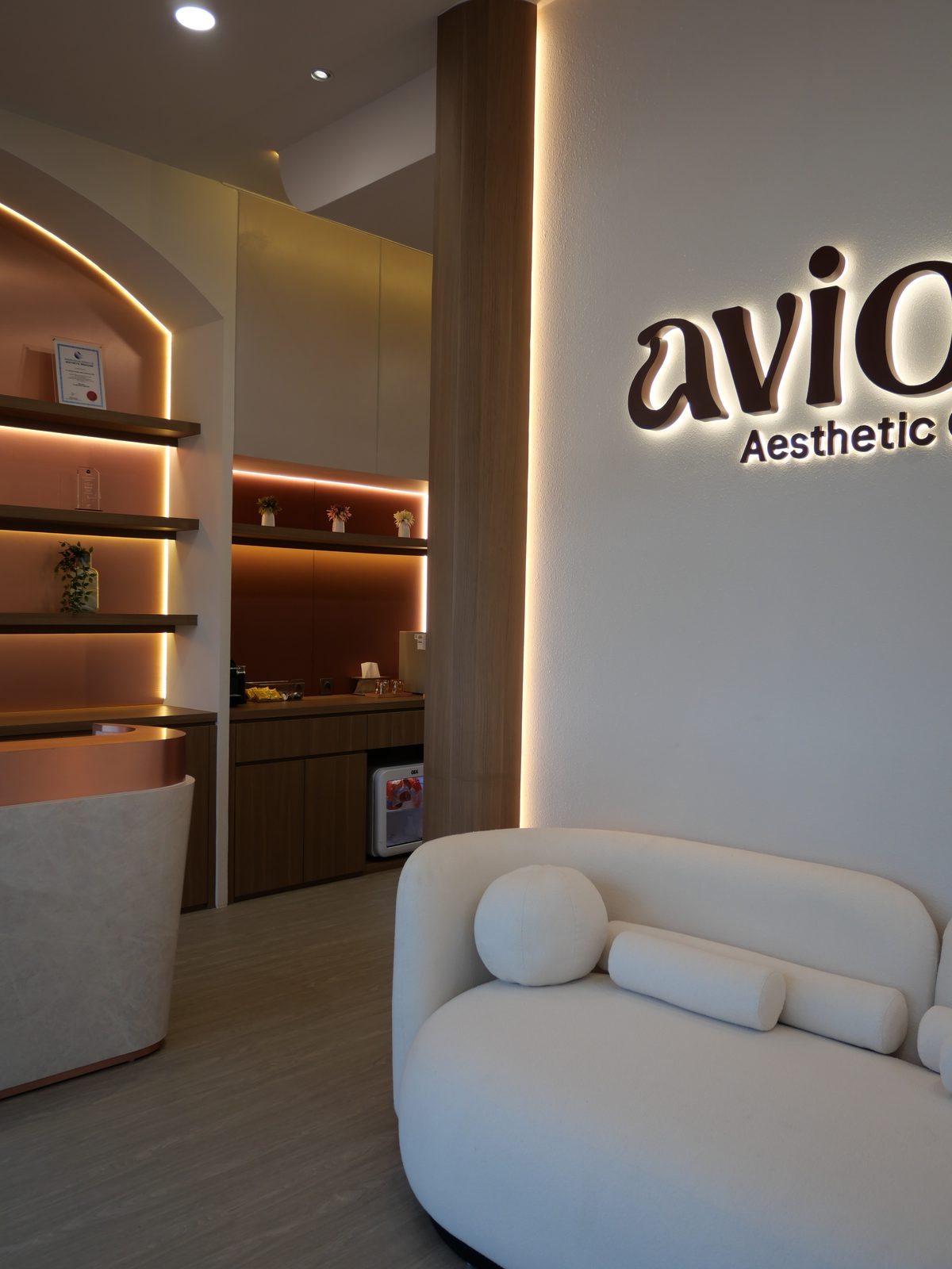 Reception with the backlit Aviora brand sign