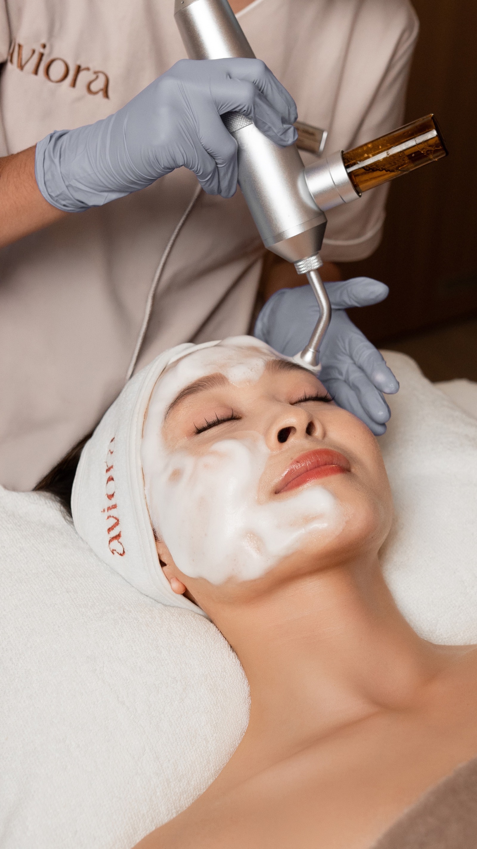 Facial treatment in progress at Aviora